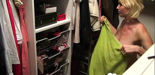  Hot blonde shows tits while changing clothes